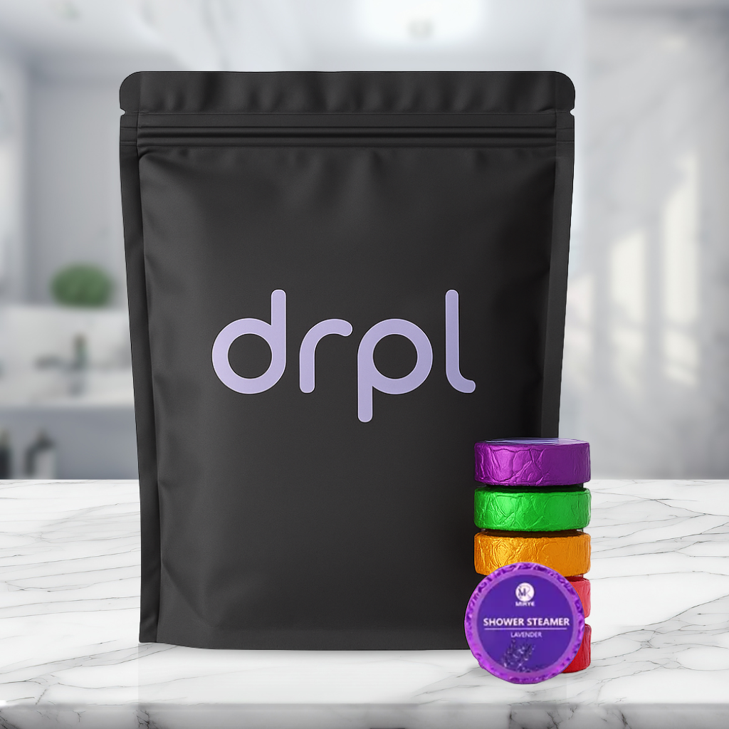 drpl Shower Steamers in luxury gift packaging with colorful aromatherapy tablets for spa-like shower experience