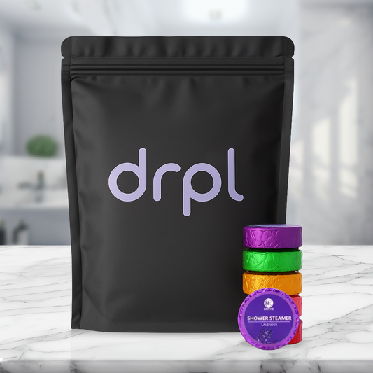 drpl Shower Steamers in luxury gift packaging with colorful aromatherapy tablets for spa-like shower experience